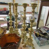 A set of 4 brass church 'pricket' candlesticks, approximately 20" tall.