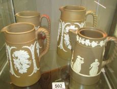 3 19th century stoneware jugs and a stoneware pot (missing lid).