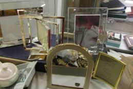 A quantity of new photo frames including Waterford etc.