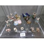 A mixed lot of animal figures including Beswick and Wade.