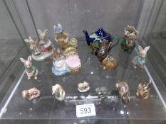 A mixed lot of animal figures including Beswick and Wade.