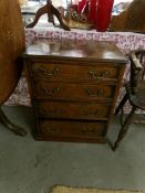 A 4 drawer chest.