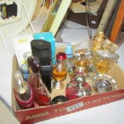 A mixed lot of scent bottles (some with part contents).