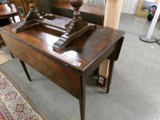 A mahogany Pembroke table.