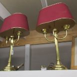 A pair of double light table lamps with shades.