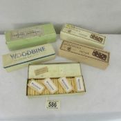 5 sets of vintage dominoes including 2 Woodbine.