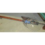 A quantity of fishing rods, keep net etc.