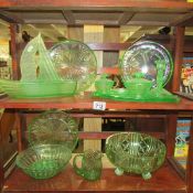 A mixed lot of green glass ware.