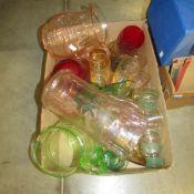 A box of coloured glass ware including lemonade sets.