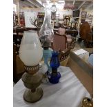 A quantity of oil lamps etc.