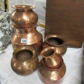 A mixed lot of old copper bowls etc.