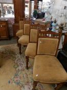 A set of 4 Edwardian dining chairs.