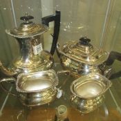 A 4 piece silver plate tea set.