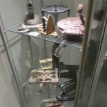 A mixed lot of metal ware including flat irons, trivets, boot scraper etc.