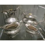 An engraved 4 piece silver plate tea set.