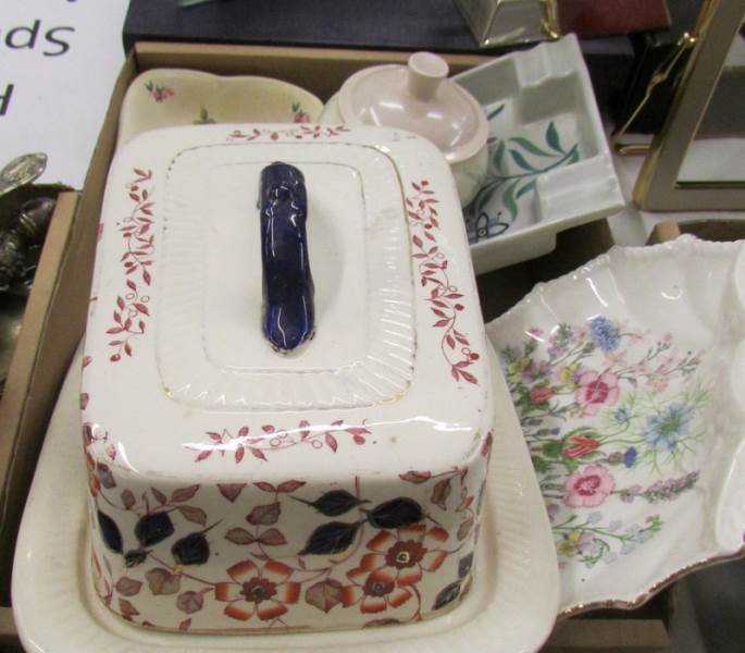 A tray of ceramic items including Poole pottery.