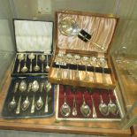 4 cased sets of teaspoons.