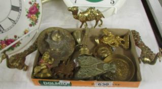 A mixed lot of brass ornaments including peacocks, etc.