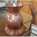 A large copper jug.