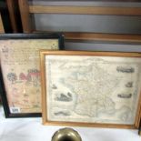 A framed and glazed 19th century map of France together with a framed and glazed print of a Sampler.