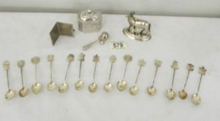 14 coffee spoons with coat of arms finial's, a trinket box, a miniature photo frame,