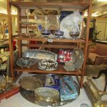 A mixed lot of silver plate including trays, candelabra, tea set etc.