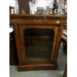 A Victorian mahogany inlaid pier cabinet.