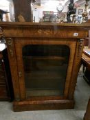 A Victorian mahogany inlaid pier cabinet.