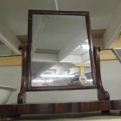 A Victorian mahogany toilet mirror.