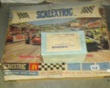 A Scalextric set (completeness unknown).