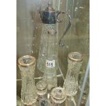 3 glass vases with silver rims,