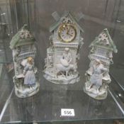 A 3 piece bisque porcelain clock garniture.