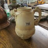 An interesting jug with mask spout marked W & R, made in Austria.