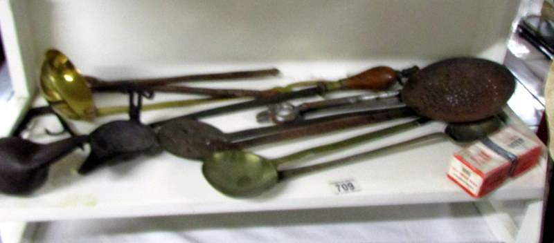 A mixed lot of vintage metal utensils including skimmer, 2 Georgian wax drip pans etc.
