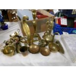 A mixed lot of brassware including candlestick, cobra etc.