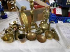 A mixed lot of brassware including candlestick, cobra etc.