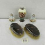 A pair of miniature silver rimmed vase, another silver rimmed vase and 2 vintage hair brushes.