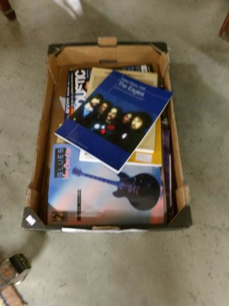 A box of general music books.