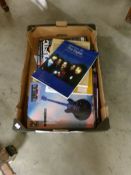 A box of general music books.