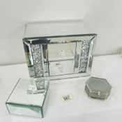 A mirrored jewellery chest and 2 jewellery boxes.