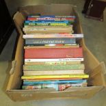 A box of mainly children's books.