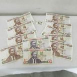 9 x 1000 and 2 x 100 Kenya bank notes.