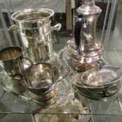 A mixed lot of silver plater including wine bottle holder, water jug etc.