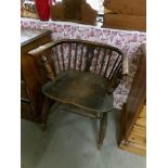 A 19th century Windsor chair with cut down back.