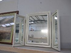 A triptych dressing table mirror