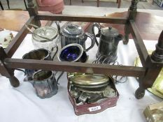 A collection of silverplate and metalware