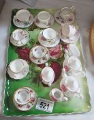 A miniature tea set on tray