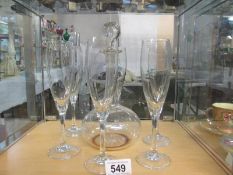 A decanter and six glasses