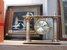 An unusual framed and glazed clock featuring Tower Bridge and another clock