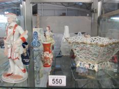 A collection of figures and pottery including Victorian